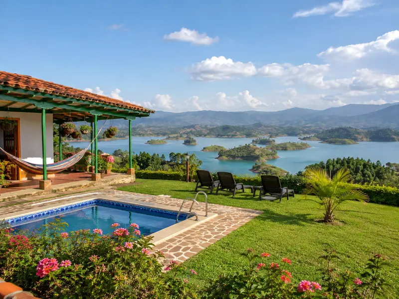 Traditional Colombian finca with pool and hammock overlooking the Guatapé reservoir